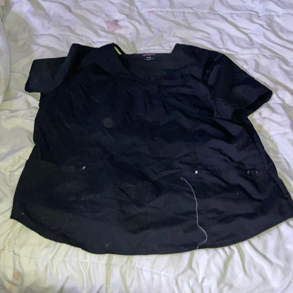 Woman’s black scrubs shirt
